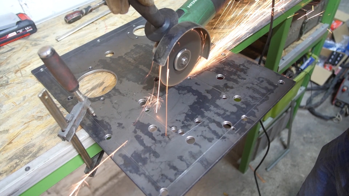 cutting out holes in steel plate